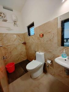 Koupelna v ubytování Aanandam - An Independent Villa in 1 Acre Farm