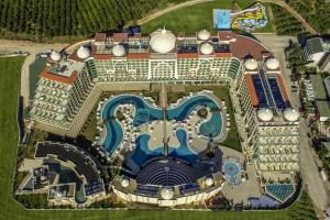 an aerial view of a resort with a swimming pool at Alan Xafira Deluxe Resort & Spa-ULTRA ALL INCLUSIVE in Alanya