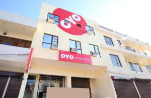 a building with an ovo sign on it at Hotel Royal shades in Chandīgarh