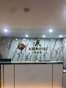 a marble wall with a akrotiri sign on it at A25 Hotel - 12 Ngô Sỹ Liên in Hanoi