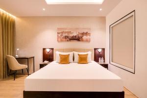 Keys Select by Lemon Tree Hotels, Udaipur客房内的一张或多张床位