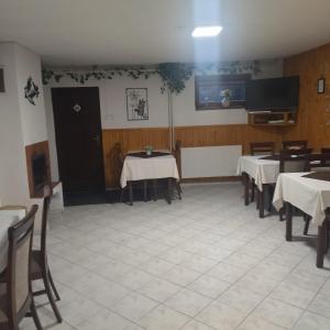 Reštaurácia alebo iné gastronomické zariadenie v ubytovaní Penzion Helena
