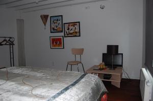 Llit o llits en una habitació de Bvba Bacana