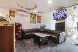 Μια τηλεόραση ή/και κέντρο ψυχαγωγίας στο Via Roadway Inn - Nr Yashobhoomi Convention Centre