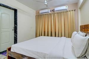 Postel nebo postele na pokoji v ubytování Palette - HD Beach Resort