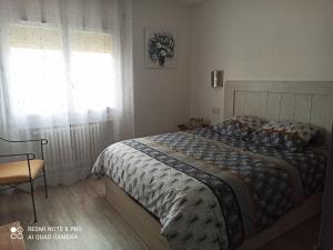 A bed or beds in a room at Palamos Carrer Del Mar