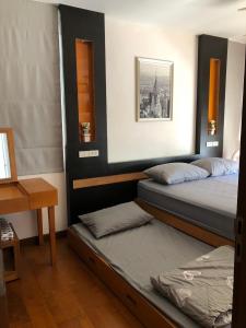 Katil atau katil-katil dalam bilik di Boathouse HuaHin Pool Villa