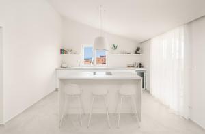 Køkken eller tekøkken på Penthouse villa Bianca Vodice