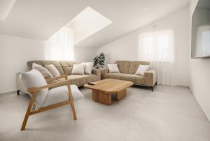 Et opholdsområde på Penthouse villa Bianca Vodice