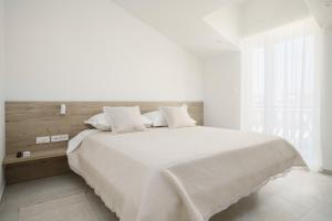 En eller flere senge i et værelse på Penthouse villa Bianca Vodice + 55 billeder