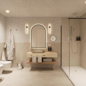 uma casa de banho com um lavatório e um espelho em MClub Marmorata em Santa Teresa Gallura