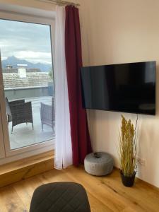 TV/Unterhaltungsangebot in der Unterkunft CityLake G23 Apartments mit kostenlosem Parkgaragen-Stellplatz !!