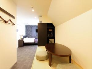 Postel nebo postele na pokoji v ubytování CHA-AN HOTEL UENO