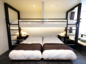 Postel nebo postele na pokoji v ubytování CHA-AN HOTEL UENO