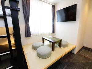 TV a/nebo společenská místnost v ubytování CHA-AN HOTEL UENO