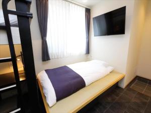 Postel nebo postele na pokoji v ubytování CHA-AN HOTEL UENO