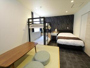 Postel nebo postele na pokoji v ubytování CHA-AN HOTEL UENO