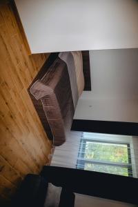 an overhead view of a room with a window at Four Rooms Apartments in Cherkasy