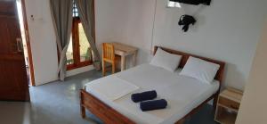 Кровать или кровати в номере Ocean Vibe Srilanka
