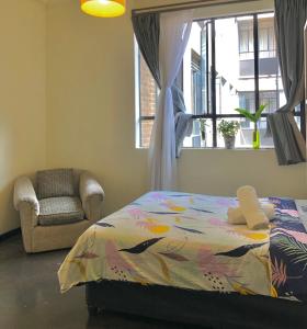 Katil atau katil-katil dalam bilik di Sun's spacious apartment +23 gambar