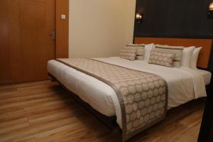Postel nebo postele na pokoji v ubytování HOTEL SR