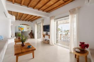 A television and/or entertainment centre at Ker Estate by Ethos Hospitality