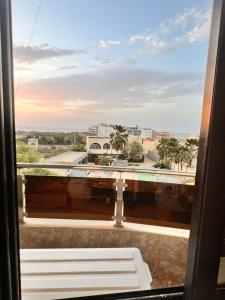 Φωτογραφία από το άλμπουμ του Appartement meublé au virage σε Yof