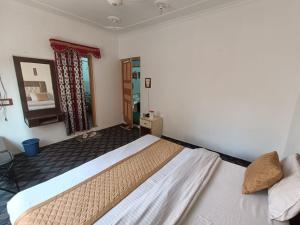 Letto o letti in una camera di Hotel New Heaven Canal