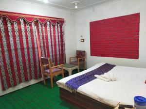 Letto o letti in una camera di Hotel New Heaven Canal