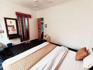 Letto o letti in una camera di Hotel New Heaven Canal