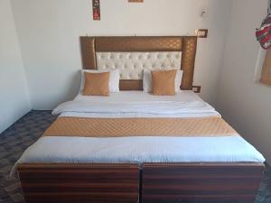 Letto o letti in una camera di Hotel New Heaven Canal