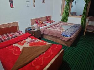 Letto o letti in una camera di Hotel New Heaven Canal