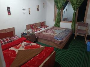 Letto o letti in una camera di Hotel New Heaven Canal