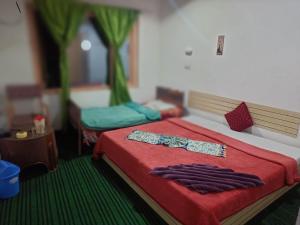 Letto o letti in una camera di Hotel New Heaven Canal