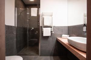 Koupelna v ubytování Hotel Impresja