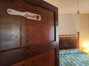 A bed or beds in a room at Agriturismo Podere Fiume