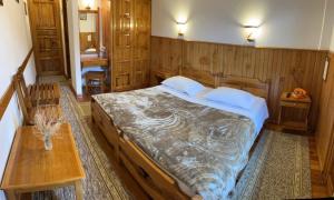 Voodi või voodid majutusasutuse HOTEL MARI Metsovo toas