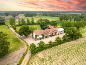 an aerial view of a house in a field at De Blauwe Maaten in Opglabbeek