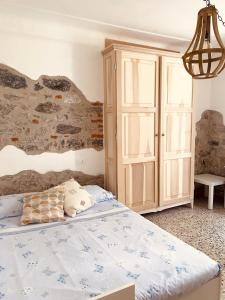 Ein Bett oder Betten in einem Zimmer der Unterkunft ‘’Perla Marina’‘