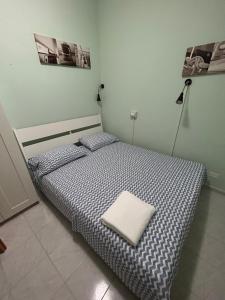 A bed or beds in a room at Casa Vacanze Domus