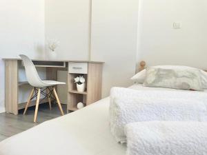 Postel nebo postele na pokoji v ubytování Apartman Niko