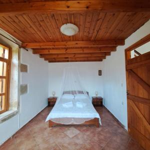 Ένα ή περισσότερα κρεβάτια σε δωμάτιο στο Villa Nama