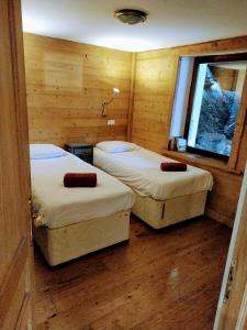 Кровать или кровати в номере Prakka - Base Camp