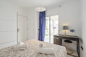 Cama o camas de una habitación en Chalet Playa de Las Americas 31 fotos más