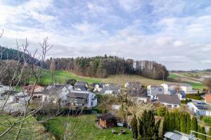 an aerial view of a town with houses and trees at Appartment Naturblick in Stockach