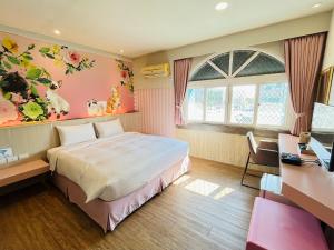 Postel nebo postele na pokoji v ubytování 南天海旅店 + 8 fotografií