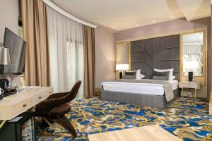 TV o dispositivi per l'intrattenimento presso A Hoteli - Hotel Park