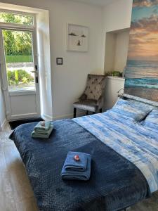 Voodi või voodid majutusasutuse Lily Bank Room toas