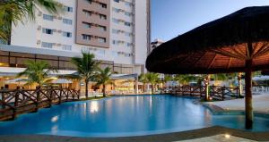 A piscina localizada em Apartamento Le Jardin ou nos arredores