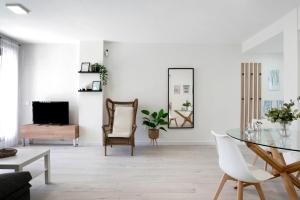 Телевизор и/или развлекательный центр в Apartamento Coral - Solo familias